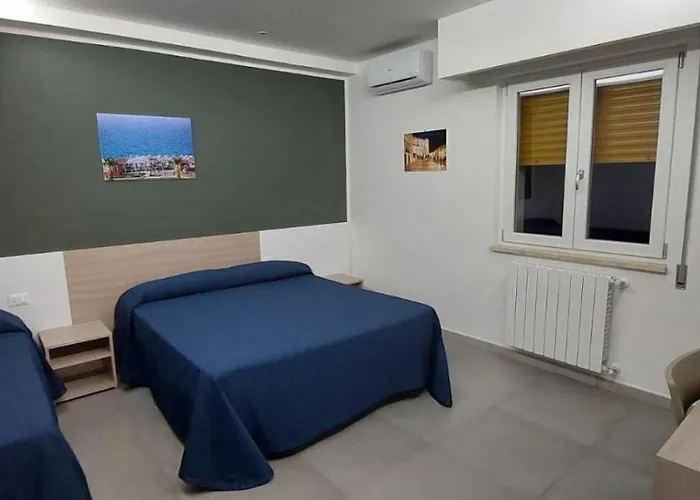 Alojamento de Acomodação e Pequeno-almoço Tritone Corigliano Calabro